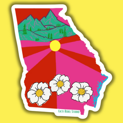 Colorful sticker of a stylized map of Georgia with mountains, sun, and flowers on a yellow background.