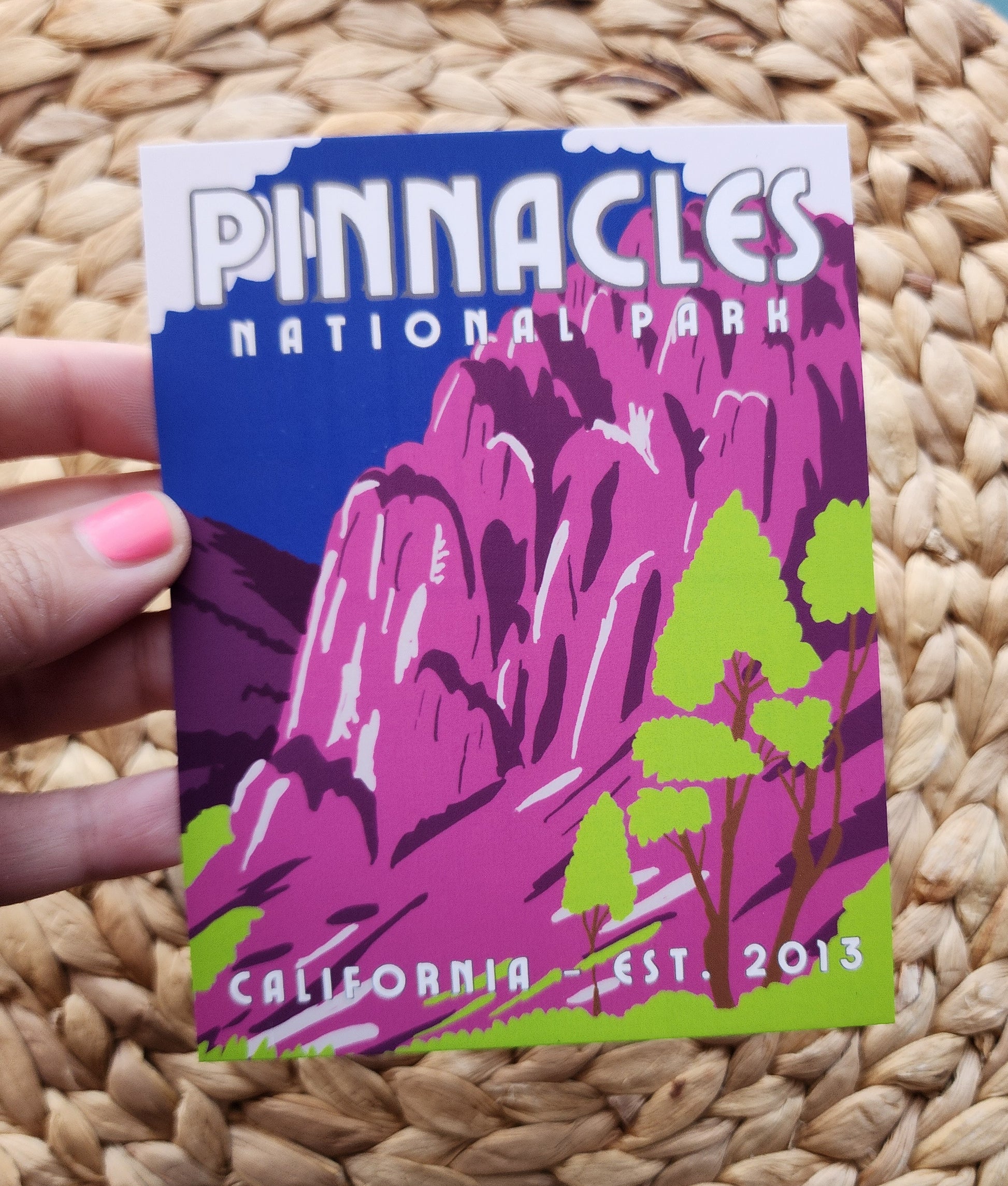 Pinnacles National Park Postcard with blue sky and white clouds behind purple mountains