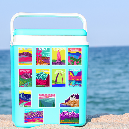 Cooler with national park stickers covering it. 